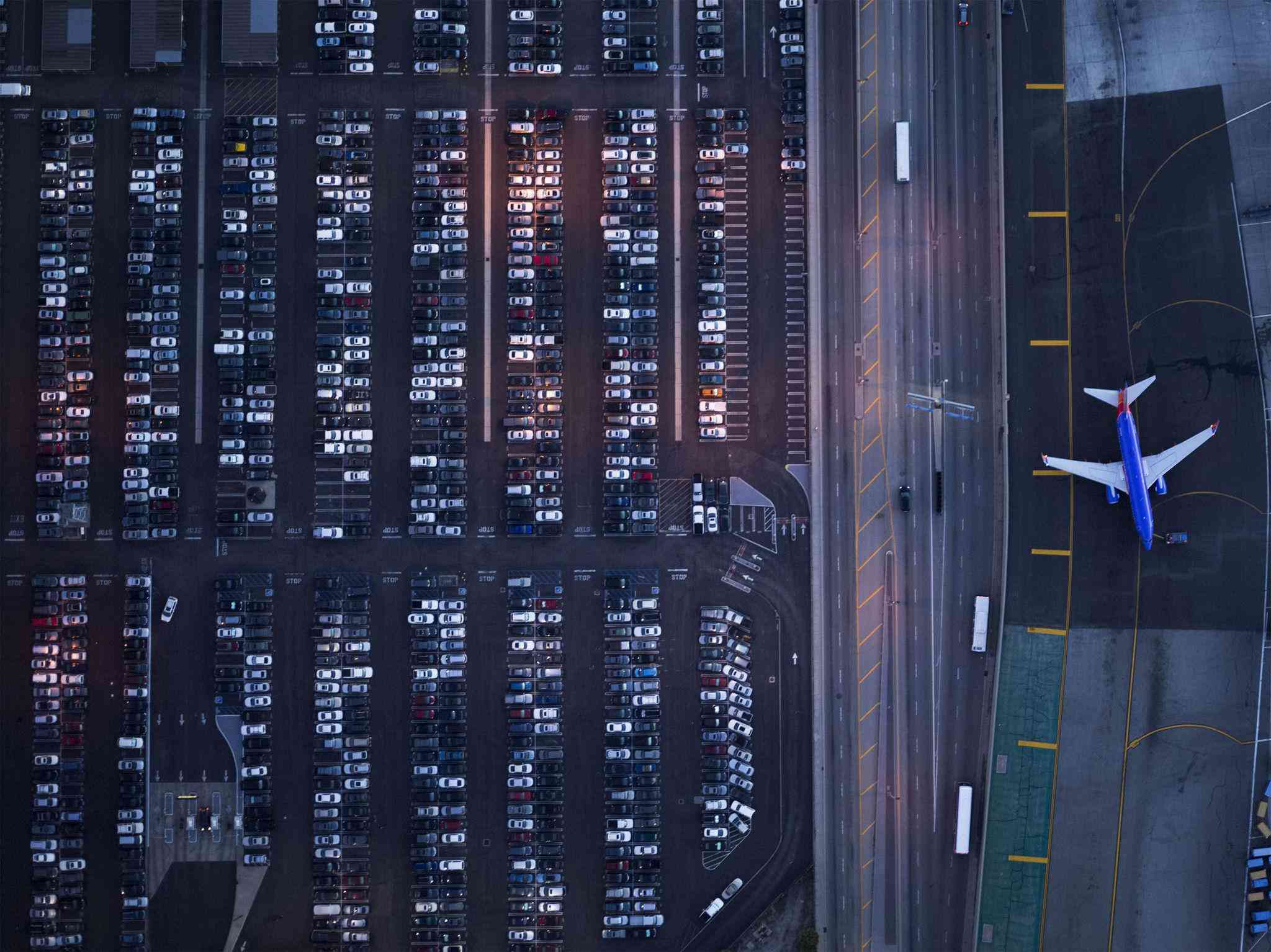 Aerial view of airport parking lots and aircraft near LAX