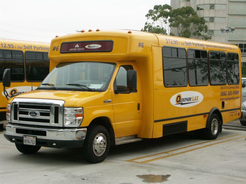 Airport parking shuttle bus near LAX transporting passengers