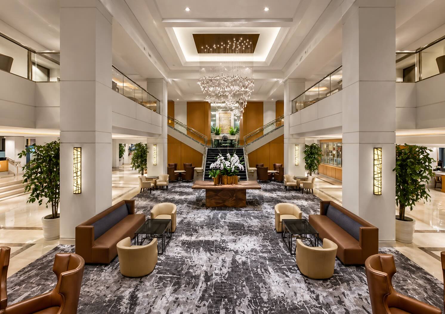 Hotel lobby near LAX with seating, Wi-Fi and waiting area
