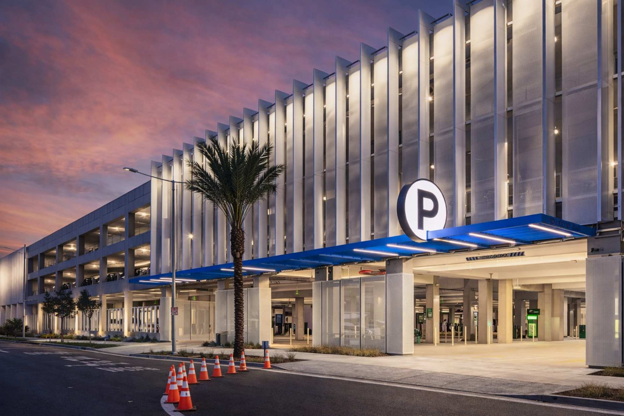 Modern LAX parking garage exterior at dusk